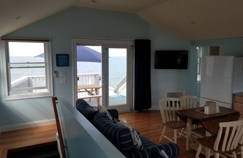 Cape Cod House | One bedroom home located Directly on Private Beach with A/C