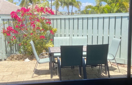Jupiter Bay Condo | One level villa. Clubhouse, pool, tennis. Barbeque on patio. Two parking spaces.