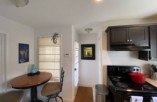 Wells Cottage | One mile to the beach! 2 br condo with deck, A/C, full kitchen, washer, dryer