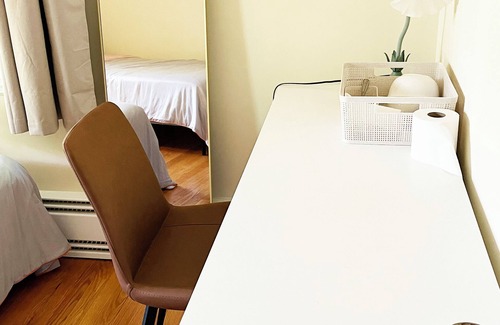 Lexington House | one room with two beds