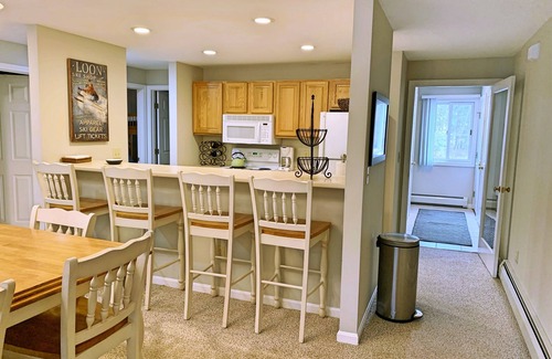 Lincoln Condo | Open concept, comfy, AC/FP, woods view, deck, swim club. F5008 by LRS