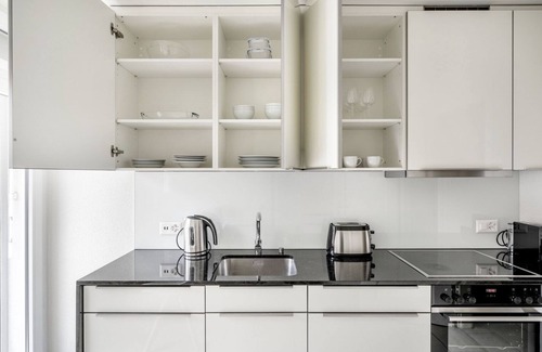 Sihlfeld Apartment | Open Wiedikon 1BR w/Private W/D, near Shops, by Blueground