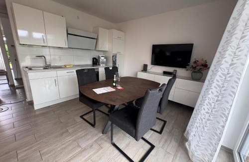 Norden Apartment | Ostfrieslands Perle Ferienwohnung an der Nordseeküste, Sauna, Terrasse, Garten, ruhige Lage, WLAN