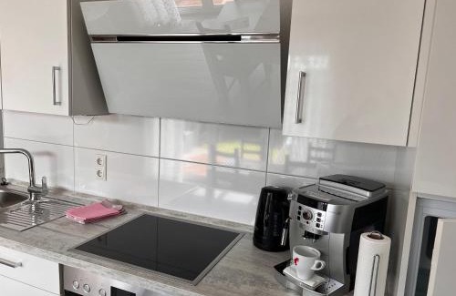 Norden Apartment | Ostfrieslands Perle Ferienwohnung an der Nordseeküste, Sauna, Terrasse, Garten, ruhige Lage, WLAN