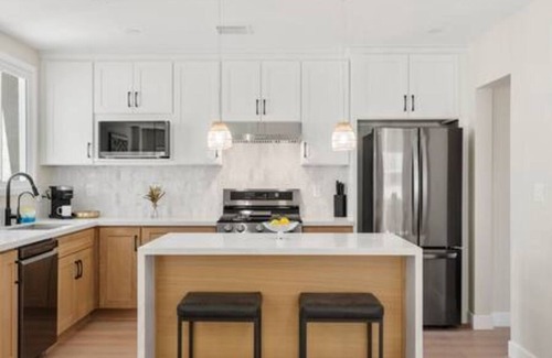 The Plaza House | Ostrom · Modern heated pool&spa + 5 mi to beach