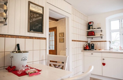 Kappeln Apartment | Our modern "Kleine Wassermühle" vacation apartment with sauna and wood-burning stove is perfect for those seeking relaxation and nature lovers