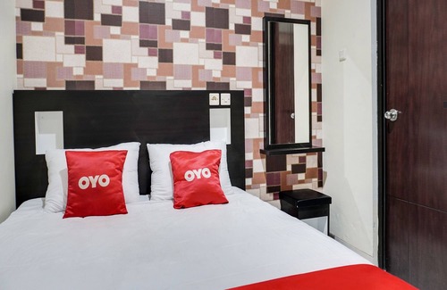 Karawang Hotel | OYO 91646 fio colombus residence