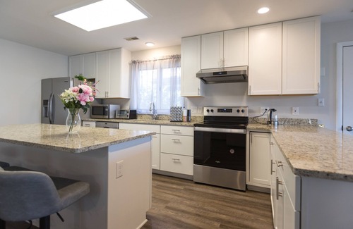 Oyster Harbor House | Oyster Harbor Waterfront Vacation Home - Private Dock and Backyard
