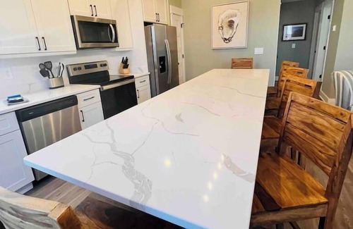 Corolla Condo | Oyster & Pearl Beautiful New Single Level Condo