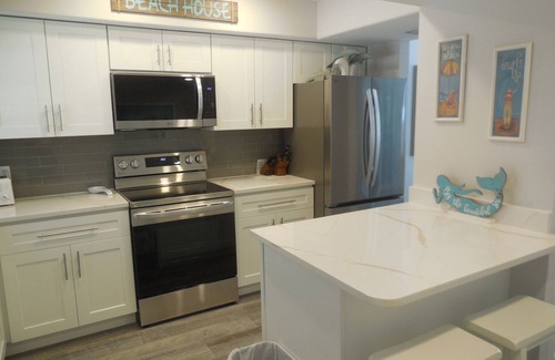 Siesta Key Condo | Palm Bay Club #168 Private beach perfect for a Stay-cation