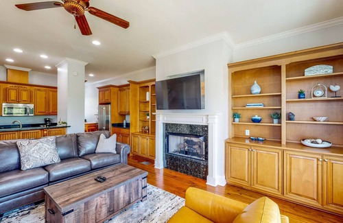 St. Marys House | Palm-lined home with dock access, firepit & inviting balconies