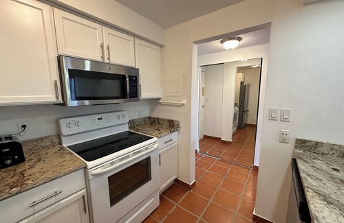 Williams Town Condo | Palm Tree Cove - Stunning Partial Ocean Views; Beachfront Location!