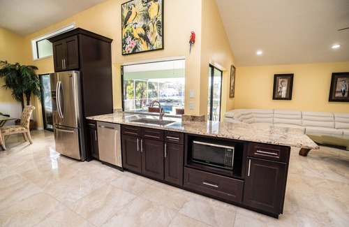 Apollo Beach House | Palm Tree III Pool Home Waterfront