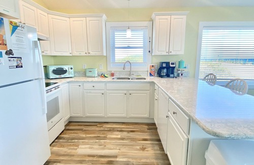 Sea Retreat House | Panoramic Ocean Views in this Updated Vintage Beach Box Right on the Beach!