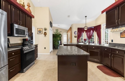 Brooksville House | Paradise found! Private heated pool spa . 3700 sq ft of luxury on 2+ acres!