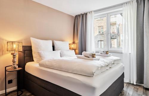 Altstadt-Nord Apartment | Park Avenue - Design Apartment Friesenstraße - 4 Pers - WLAN - Netflix - 65 Zoll TV