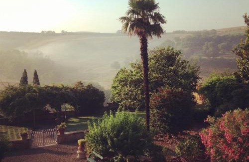 San Giovanni d'Asso Villa | Pasqui Villas La Consuma villa storica in paese con vista pscina WiFi