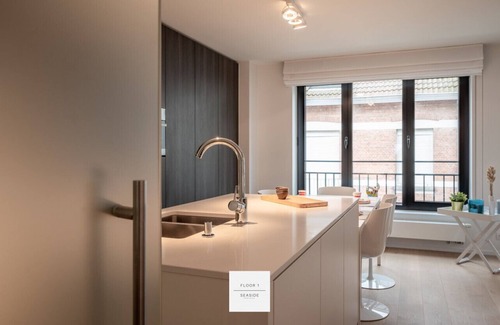 Heist Apartment | Patio Floor, sunny seaside home