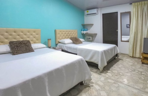 Tierra Bomba Island House | PB-T11 HABITACION CUADRUPLE EN ISLA CON DESAYUNO