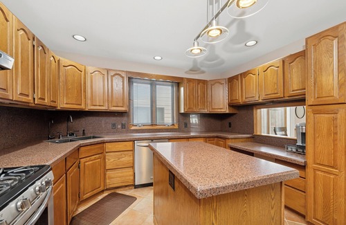 McHenry House | Peaceful and Relaxing Water Front Home with Outdoor Pool Sleeps 12
