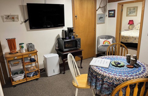 Mount Desert Apartment | Peaceful Basement Apartment among serene woods, paths, and a stream near Acadia