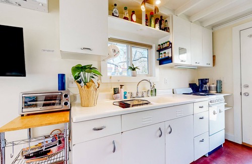 Historic Montford Apartment | Peaceful creekside cottage in the heart of Asheville with on-site firepit