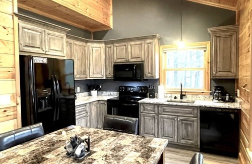 Tellico Plains Cabin | Peaceful family cabin near fishing with over 100 acres of mountain and field trails to explore! 2 Bedroom Cabin by RedAwning