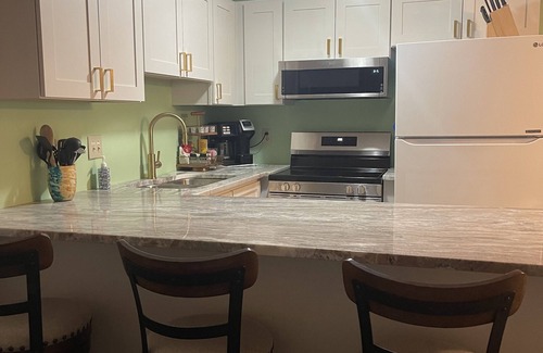 Emerald Isle Condo | Peaceful, Gated community with Indoor & Outdoor Pools.Walk to beach, dining &fun