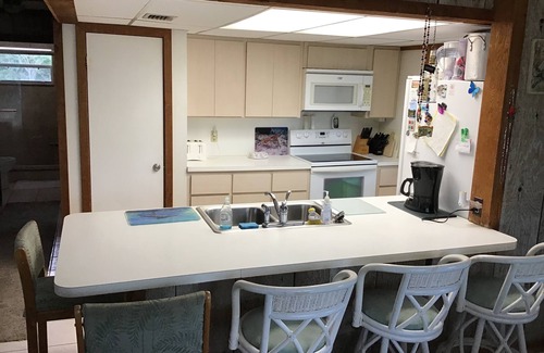 Doctor's Arm House | Peaceful island home on canal with quick access to Bogie Channel.