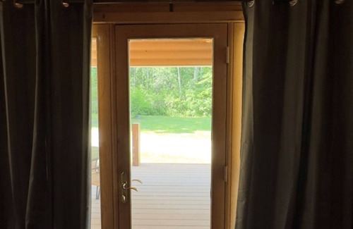 Alger Cabin | Peaceful Log Cabin Perfect for Cozy Couples' Retreat | Scenic Riverfront