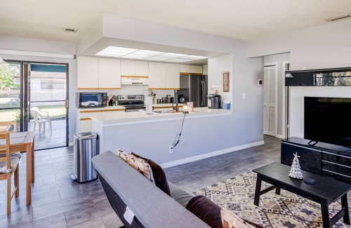 Riviera Beach House | Peaceful residential retreat with golf course views, screened lanai, & home gym