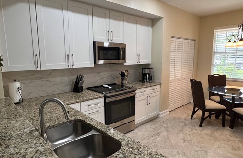 Estero Condo | Pelican Sound GC, Luxury 1st Floor Condo, All New Island Decor, Close to Beaches