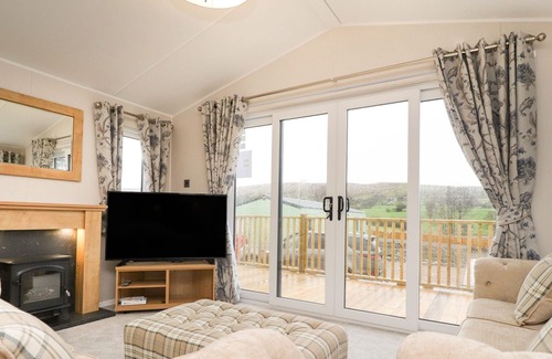Fence Cabin | PENDLE VIEW LODGE, pet friendly, with a garden in Clitheroe