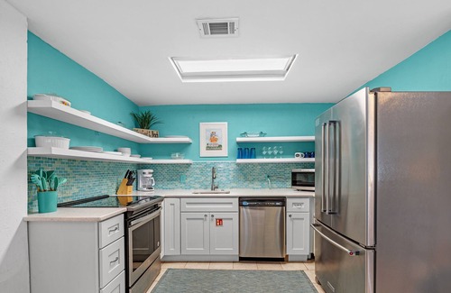 Villa Primera House | Pensacola Beach House | Elevated Deck & Outdoor Living Spaces | Beach Service | Beach Getaways