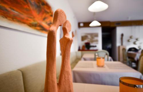 Postal Bed & Breakfast | Pension Martha