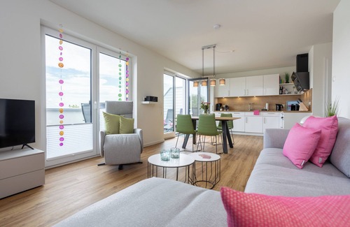 Dorumer Neufeld Apartment | Penthouse 18 - Enjoy the view. Modern. Balcony. Comfort.