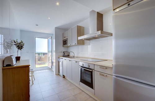 San Roque Apartment | Penthouse Apartment in Alcaidesa with Mountain View, Wi-Fi, Pool, Garden & Terrace