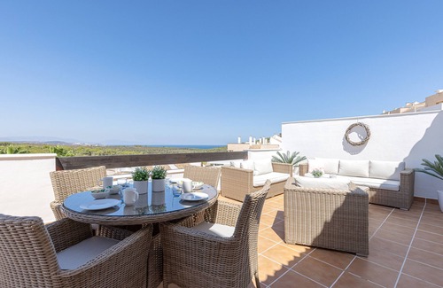 San Roque Apartment | Penthouse Apartment in Alcaidesa with Mountain View, Wi-Fi, Pool, Garden & Terrace