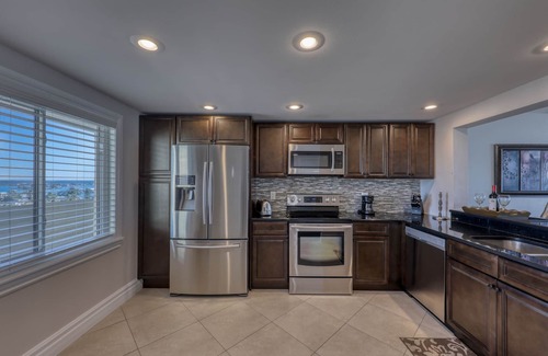 Madeira Beach Condo | Penthouse Beachfront Luxury Condo 30’ft balcony and Gulf Views @OceanSands1203