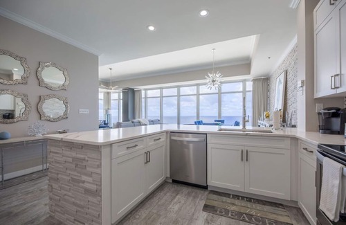 Thomas Drive Condo | Penthouse corner, floor to ceiling windows, high ceilings 2 primary a guestroom