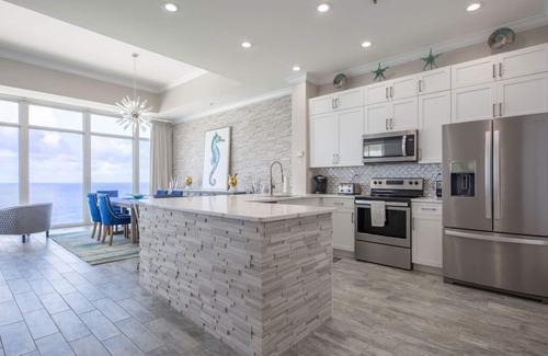 Thomas Drive Condo | Penthouse corner, floor to ceiling windows, high ceilings 2 primary a guestroom