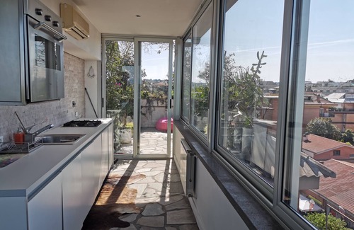 Tor di Quinto Apartment | Penthouse in picturesque Fleming where the sky merges with the beauty of Rome.