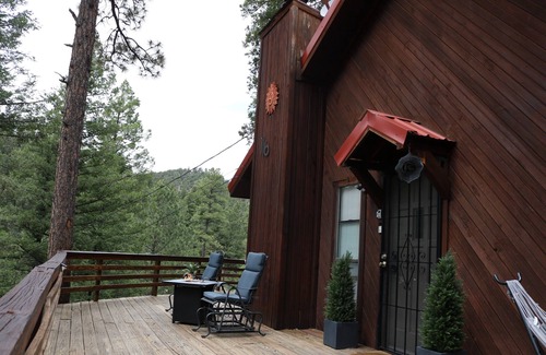 Ruidoso Cabin | Perched in the pines -wrap around porch w/outdoor dining, fire pit, & wildlife