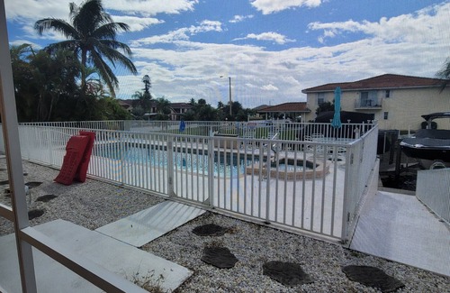 Caloosahatchee Condo | Perfect 2 Bed Getaway with Pool & hot tub, on canal, come and enjoy paradise!