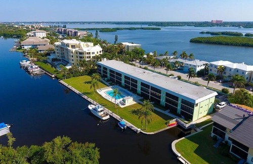 Siesta Key Condo | Perfect Location. Beautiful Waterviews. Heated Pool. 2 BD/2 BA
