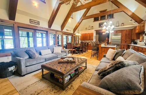Woodruff House | Perfect retreat for family fun! Private wooded lot on Little Spider Lake