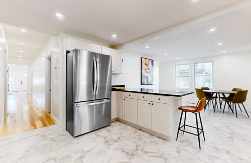 Everett House | Perfectly located modern home with smart TVs, high chair, patio, W/D, & AC