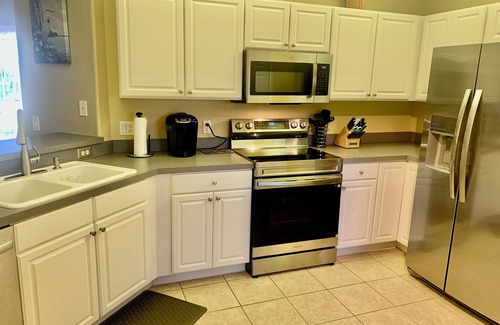 Fort Myers Condo | Pet Friendly 2 Bedroom 2 Bath Ground Floor Condo w/Lake View in Colonial CC.
