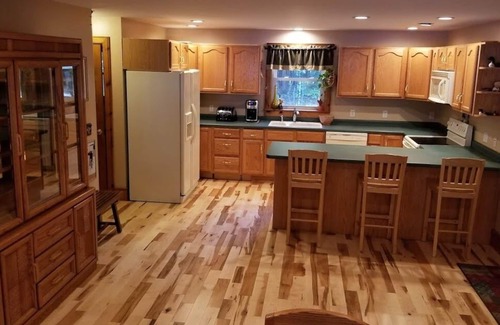 Raymond House | Pet-friendly home on peaceful Raymond Pond with beautiful sunrise views!