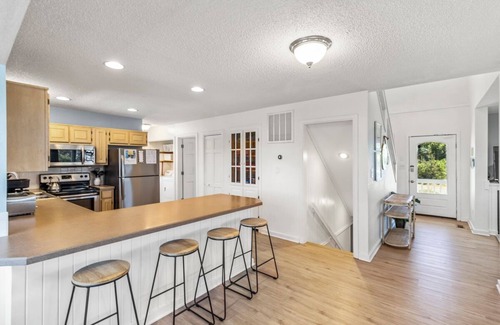 Carolina Dunes House | Pet-friendly oceanside home ocean & sound views, pool, hot tub, rec room & more